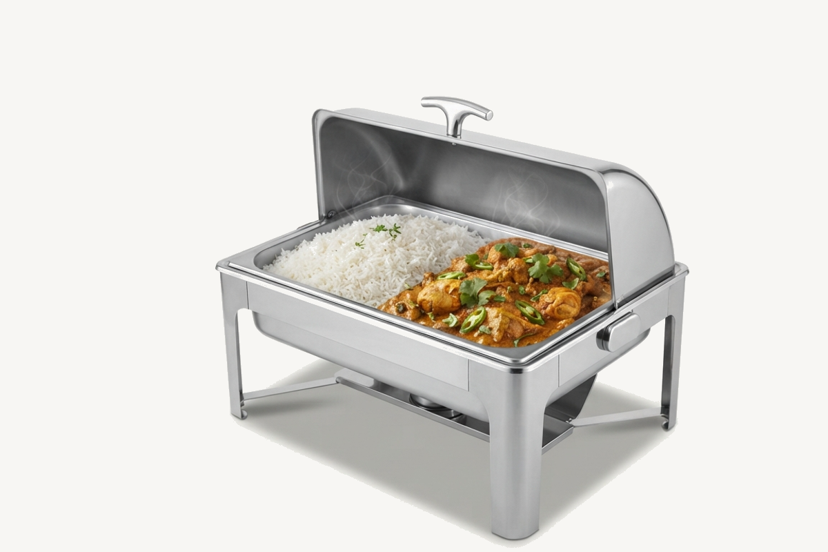 Stainless steel buffet chafing dish with the lid lifted, rice and chicken curry inside